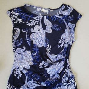 Blue cinched waist blouse.